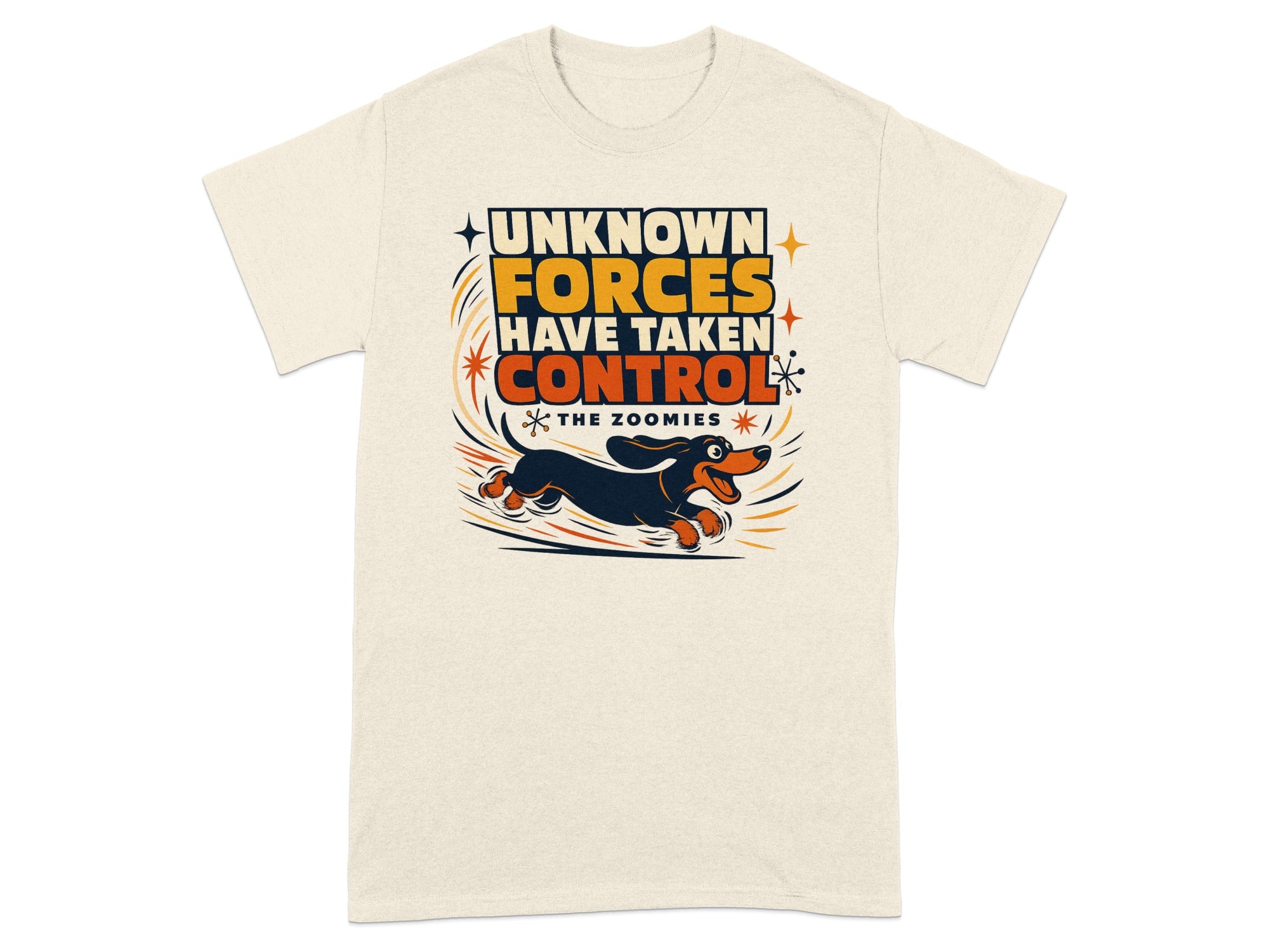 T-shirt with a cartoon dachshund running, text reads "UNKNOWN FORCES HAVE TAKEN CONTROL THE ZOOMIES".