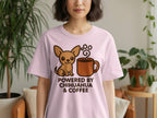 Pink t-shirt with a chihuahua and coffee cup graphic that says "Powered By Chihuahua & Coffee".