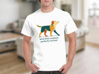 White t-shirt with geometric dog graphic and text "feral little creature, perfectly formed".