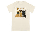 Three pugs, two light and one dark, sit on a shelf with star and boomerang decorations.