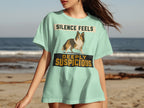 Light blue t-shirt with a dog and "SILENCE FEELS SUSPICIOUS" text.