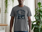 Grey t-shirt with a dark blue graphic of a schnauzer sniffing the ground and text.