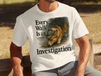 White t-shirt graphic with corgi wearing a detective hat and text "Every Walk Is an Investigation".