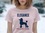 Pink t-shirt with a silhouette of a poodle and text "ELEGANCE WITH STRONG OPINIONS".