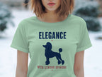 Light green t-shirt with "ELEGANCE WITH STRONG OPINIONS" and poodle graphic.