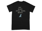 Black t-shirt with text "EAT. SLEEP. STEAL SOCKS. REPEAT." and a small dog silhouette.