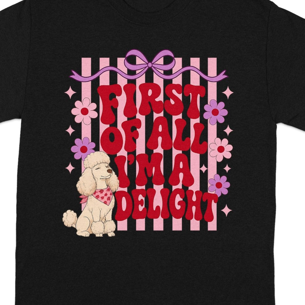 Black t-shirt with pink and purple stripes and "First of all, I'm a delight" text.