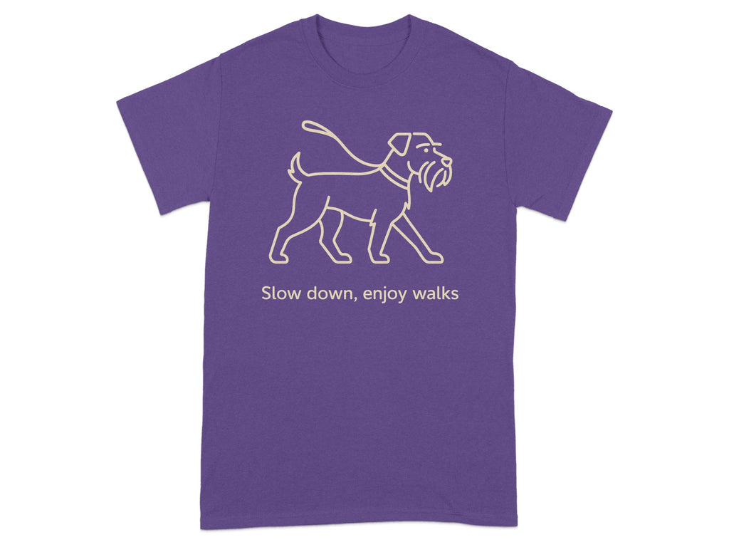 Purple t-shirt with line drawing of dog on leash and text "Slow down, enjoy walks".