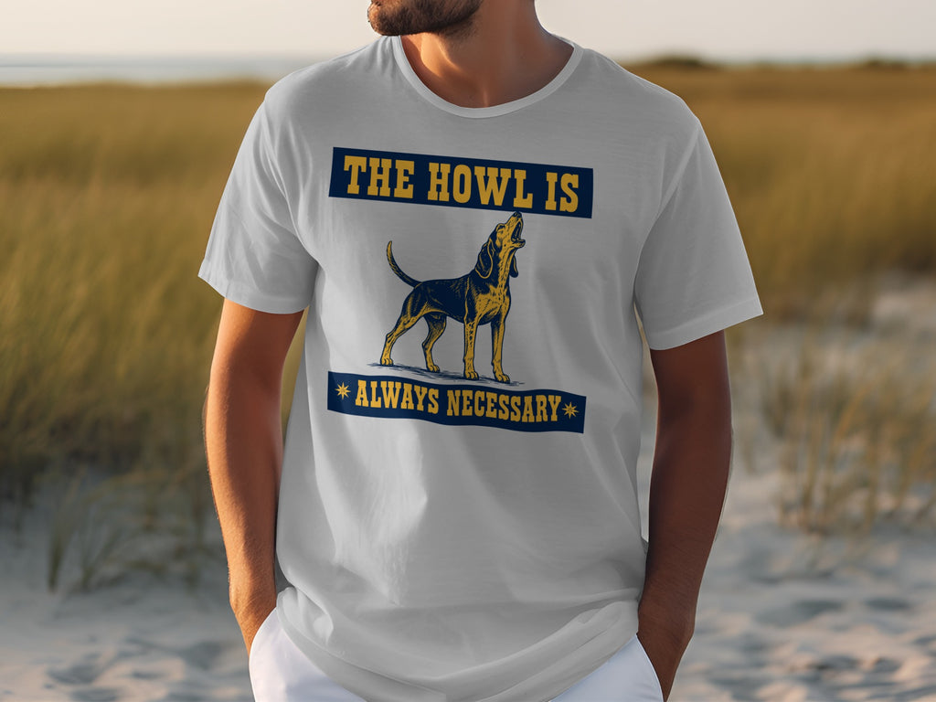 White t-shirt with a dog howling and text "The Howl Always Necessary".