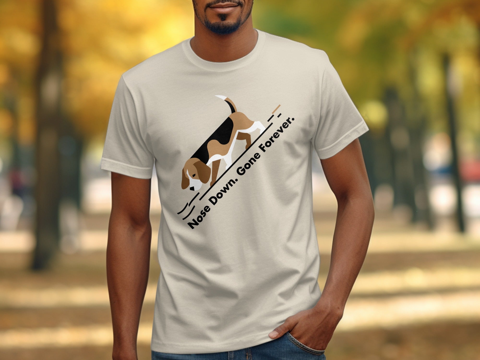 Beige t-shirt with beagle dog graphic and text "Nose Down. Gone Forever."
