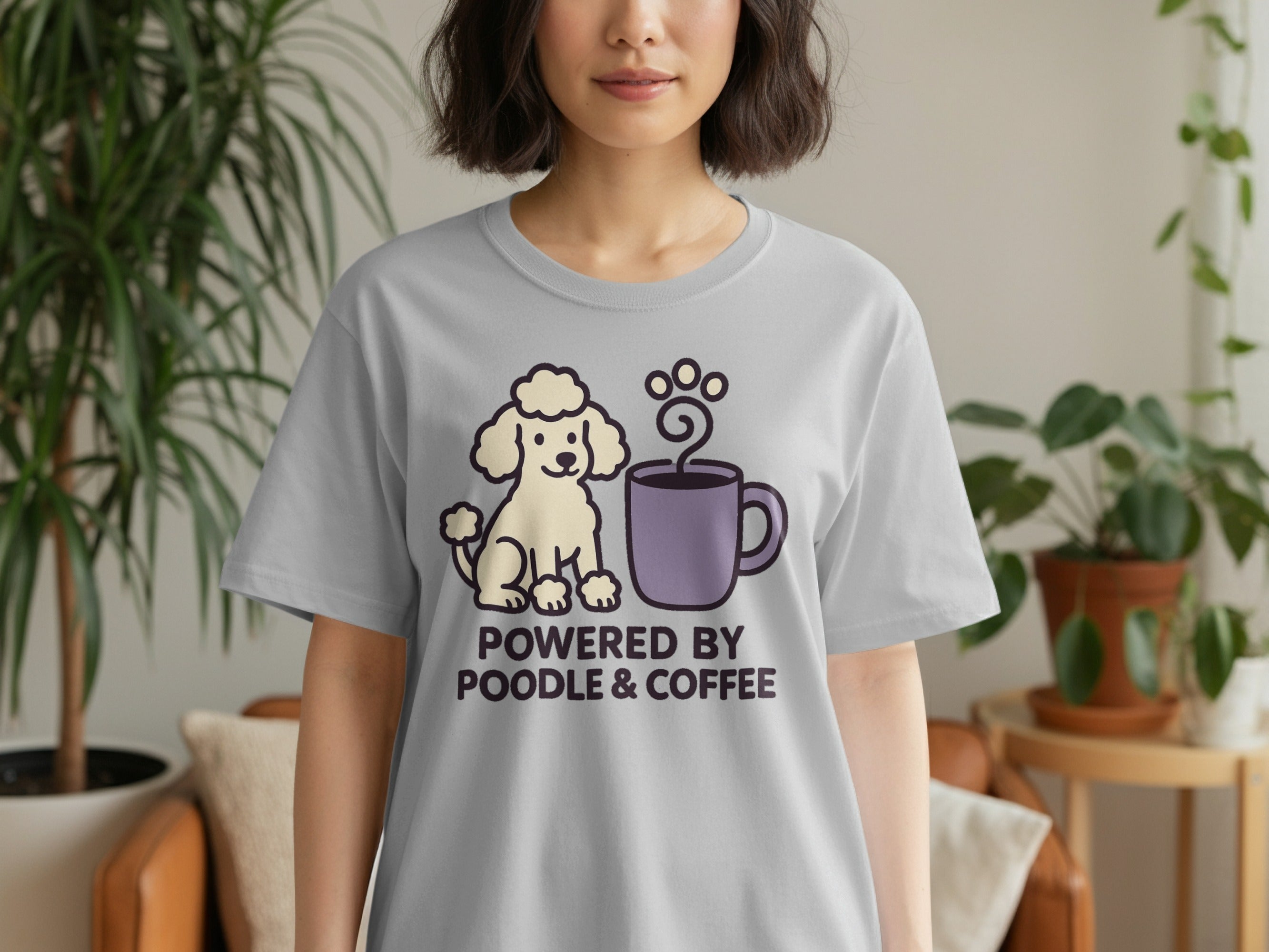 Gray t-shirt with text "POWERED BY POODLE & COFFEE" and poodle graphic.