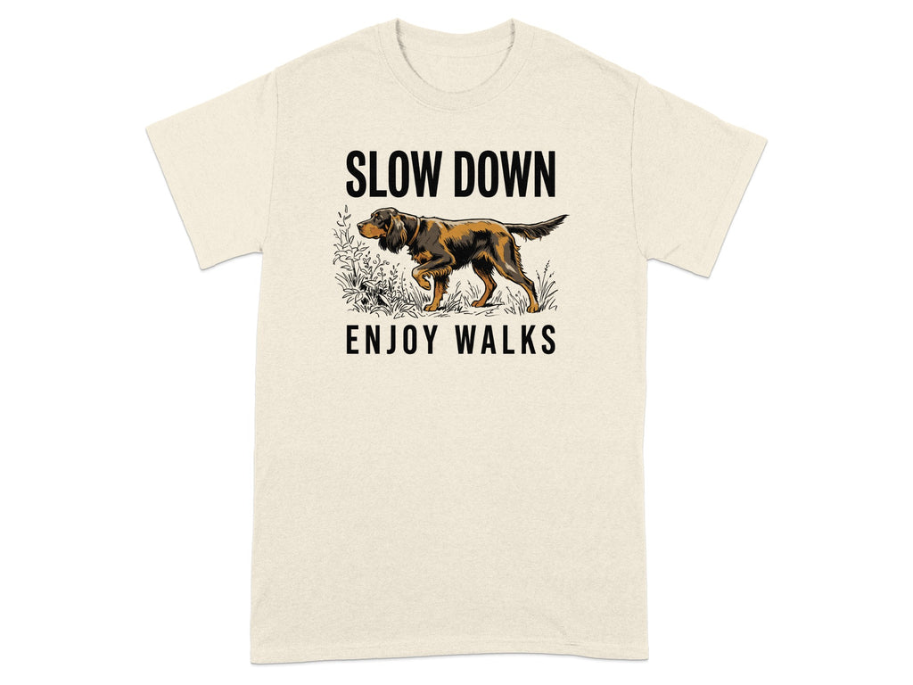Cream t-shirt with a dog walking and text that reads "SLOW DOWN ENJOY WALKS".