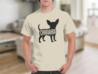 Chihuahua graphic on a cream t-shirt worn by a person.