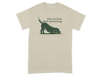 Beige t-shirt with a black graphic of a dog sniffing the ground and text.