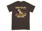 Brown t-shirt with a beagle and text "Sorry I'm late. My Beagle found something."