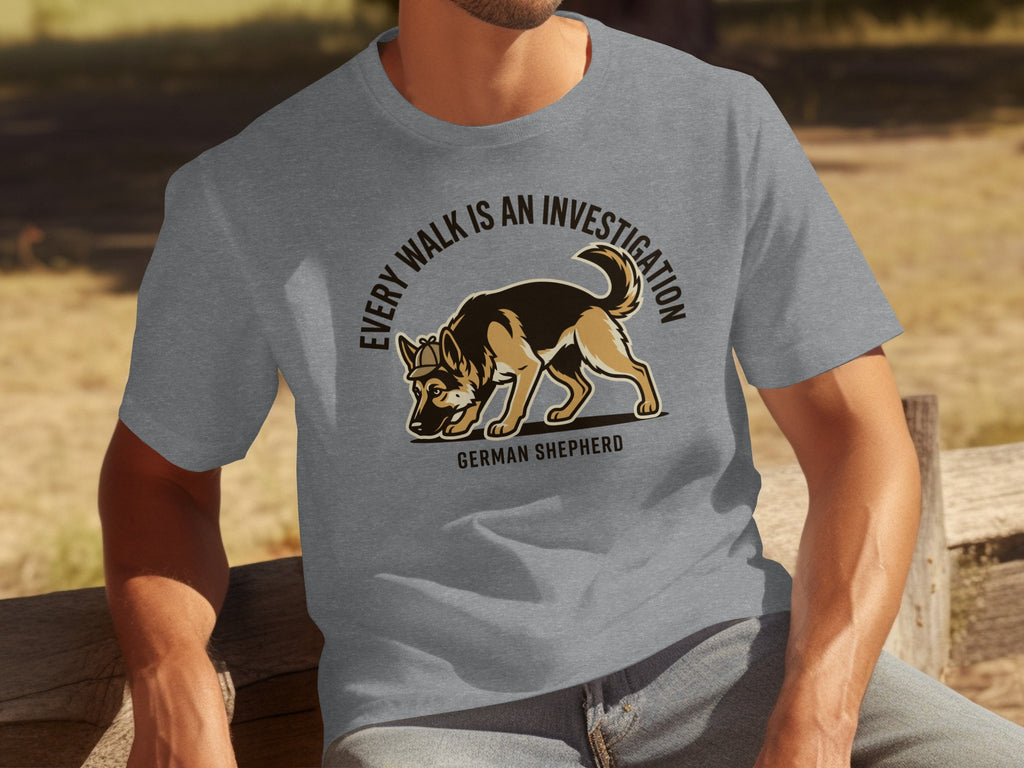 Grey t-shirt featuring a German Shepherd sniffing the ground with text.