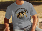 Grey t-shirt featuring a German Shepherd sniffing the ground with text.