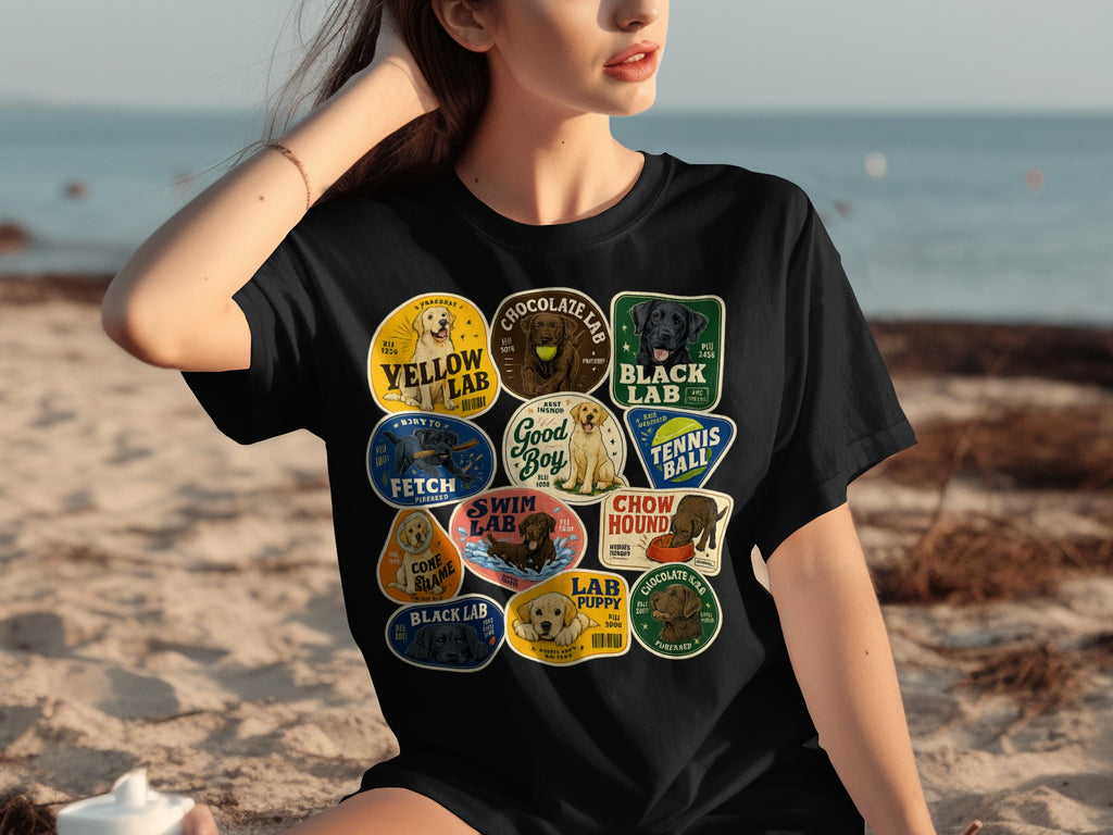 Black t-shirt with multiple circular patches featuring Labrador dogs and text.