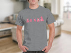 Pink dog illustrations in varying poses on a grey t-shirt.