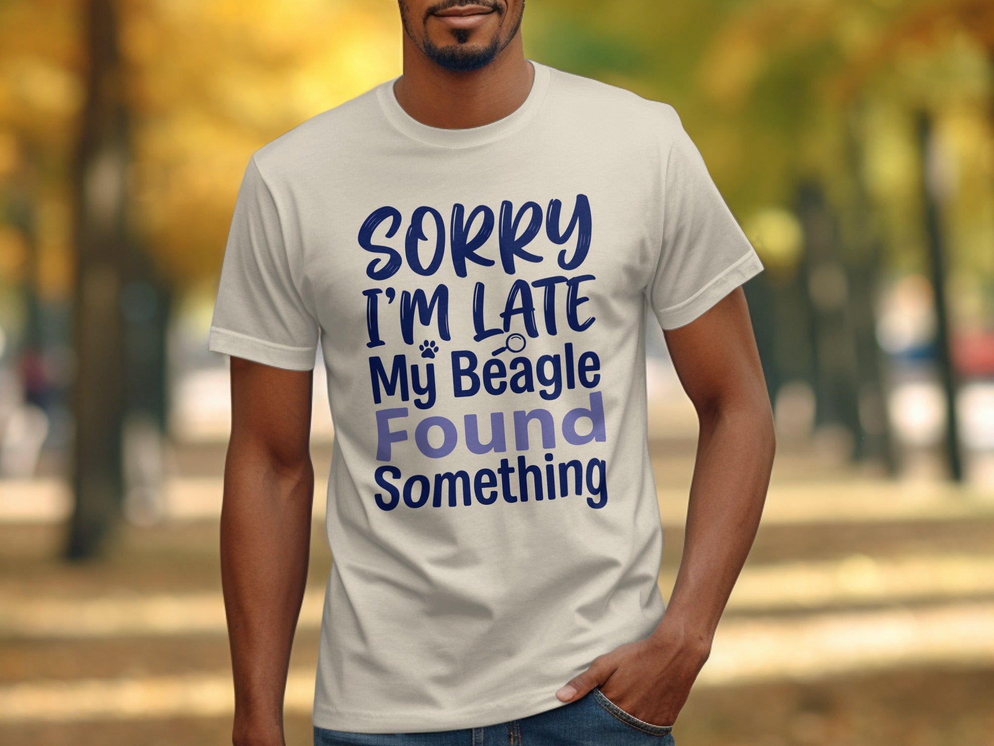 White t-shirt with dark blue text reading "SORRY I'M LATE My Beagle Found Something".