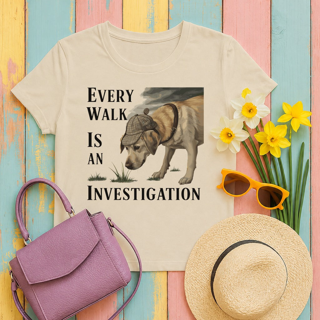 mig2 every-walk-is-an-investigation-yellow-la tee flat lay hero v8