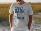 White t-shirt with "I Don't Bark, I Debate" and dog graphic.