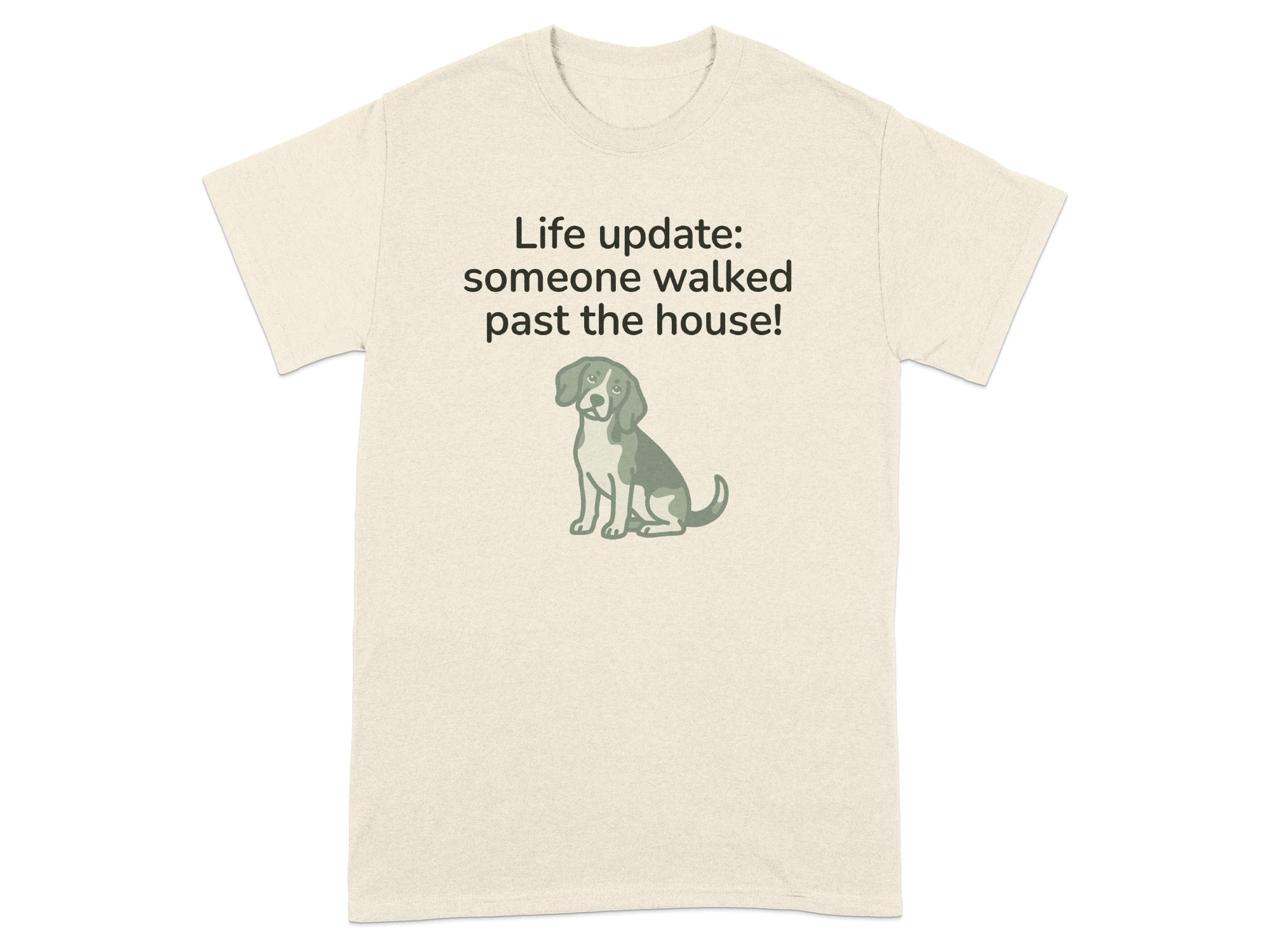 Beige t-shirt with dog graphic and text "Life update: someone walked past the house!"