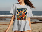 White t-shirt with "Let Sleeping Dogs Sleep. Do Not Disturb" text and dog graphic.