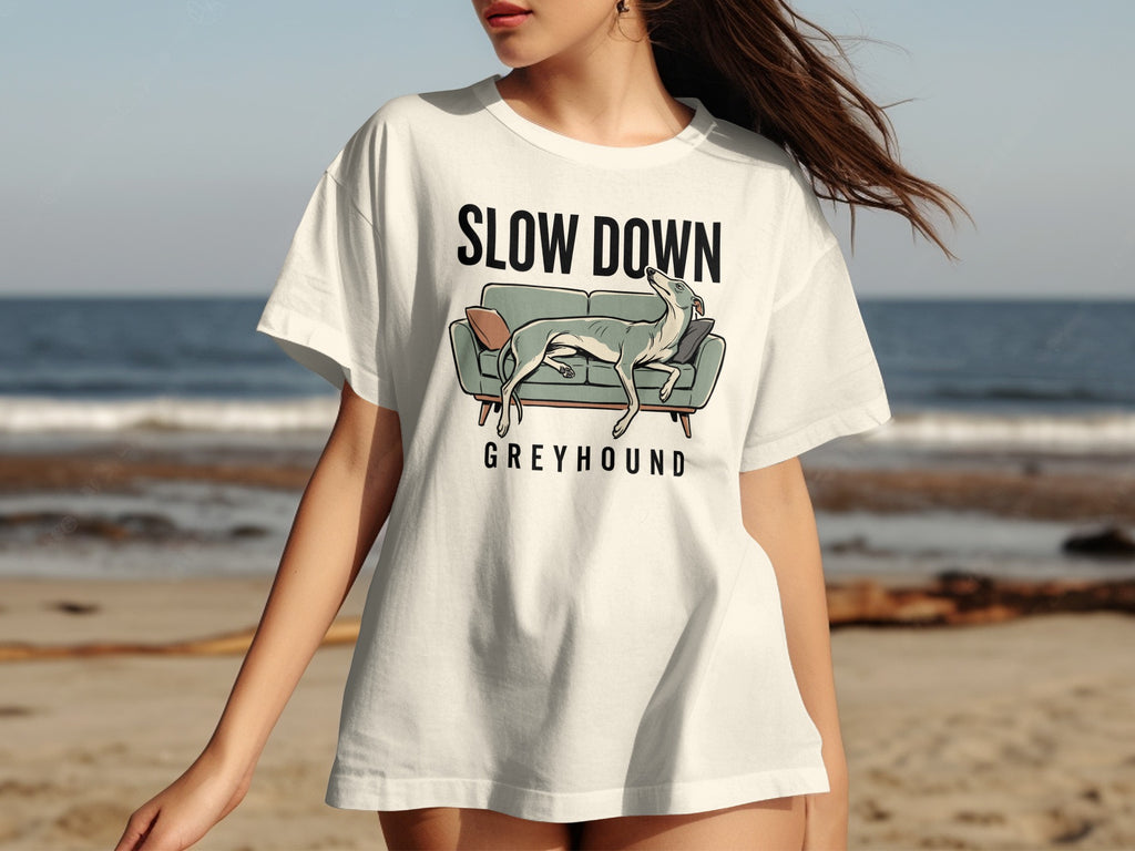 Greyhound on sofa graphic on a white t-shirt.