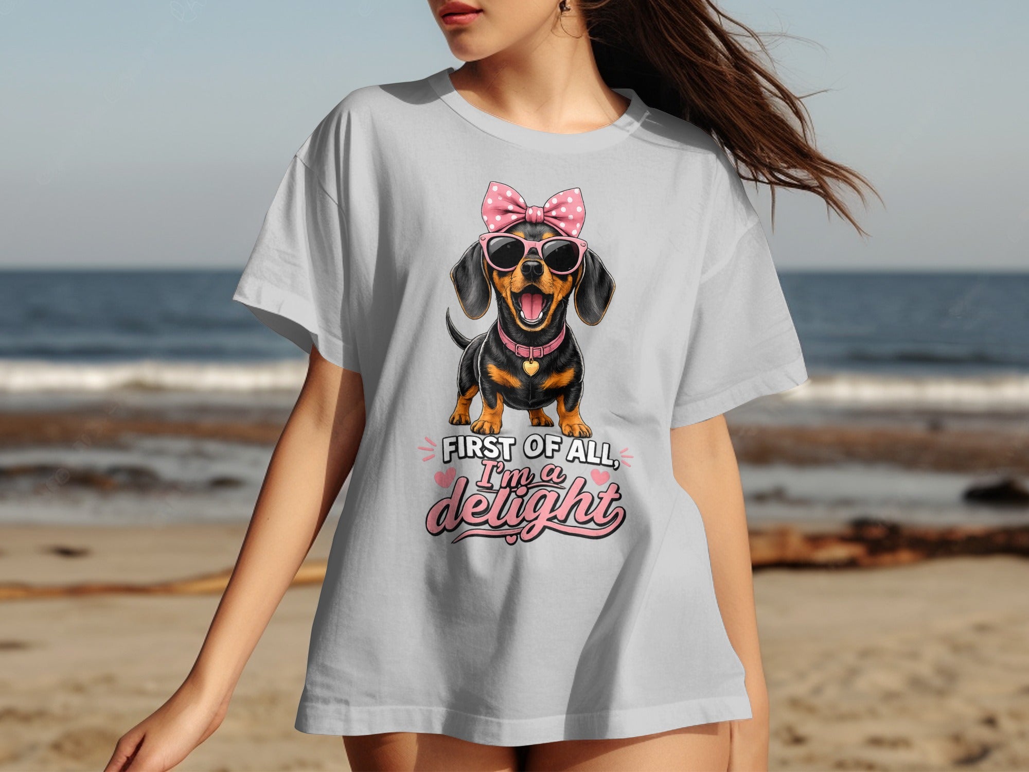 Dachshund wearing pink sunglasses and bow, with text "First of all, I'm a delight".
