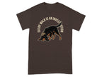 Brown t-shirt with a dog illustration and text "Every walk is an investigation."