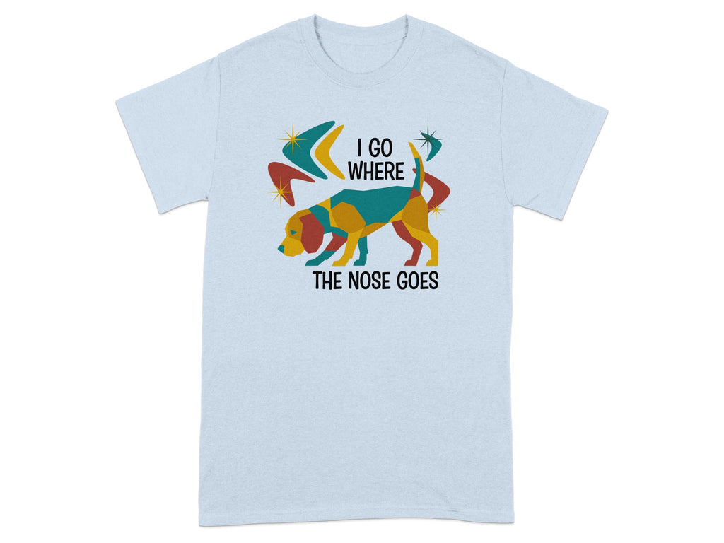 Light blue t-shirt with abstract dog and text "I GO WHERE THE NOSE GOES".