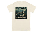 Cream t-shirt with "Stay Wild Chase Squirrels" graphic featuring a dog and squirrel.