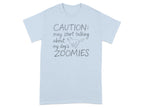 Light blue t-shirt with "CAUTION: may start talking about my dog's ZOOMIES" and a dog silhouette.
