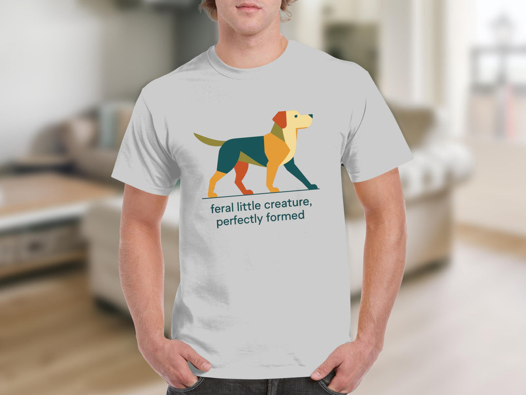 White t-shirt with abstract dog graphic and "feral little creature, perfectly formed" text.