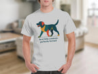 White t-shirt with geometric dog graphic and text "feral little creature, perfectly formed".
