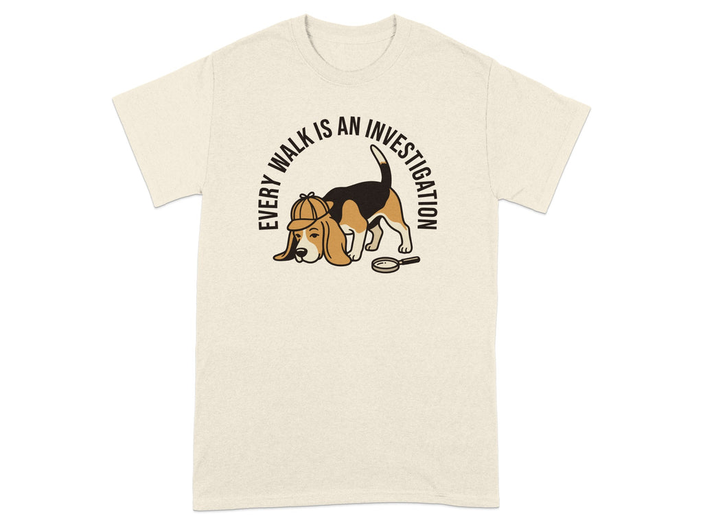 T-shirt with beagle wearing detective hat and magnifying glass, text "EVERY WALK IS AN INVESTIGATION".