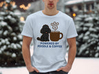 T-shirt with black poodle, coffee cup, and text "POWERED BY POODLE & COFFEE".