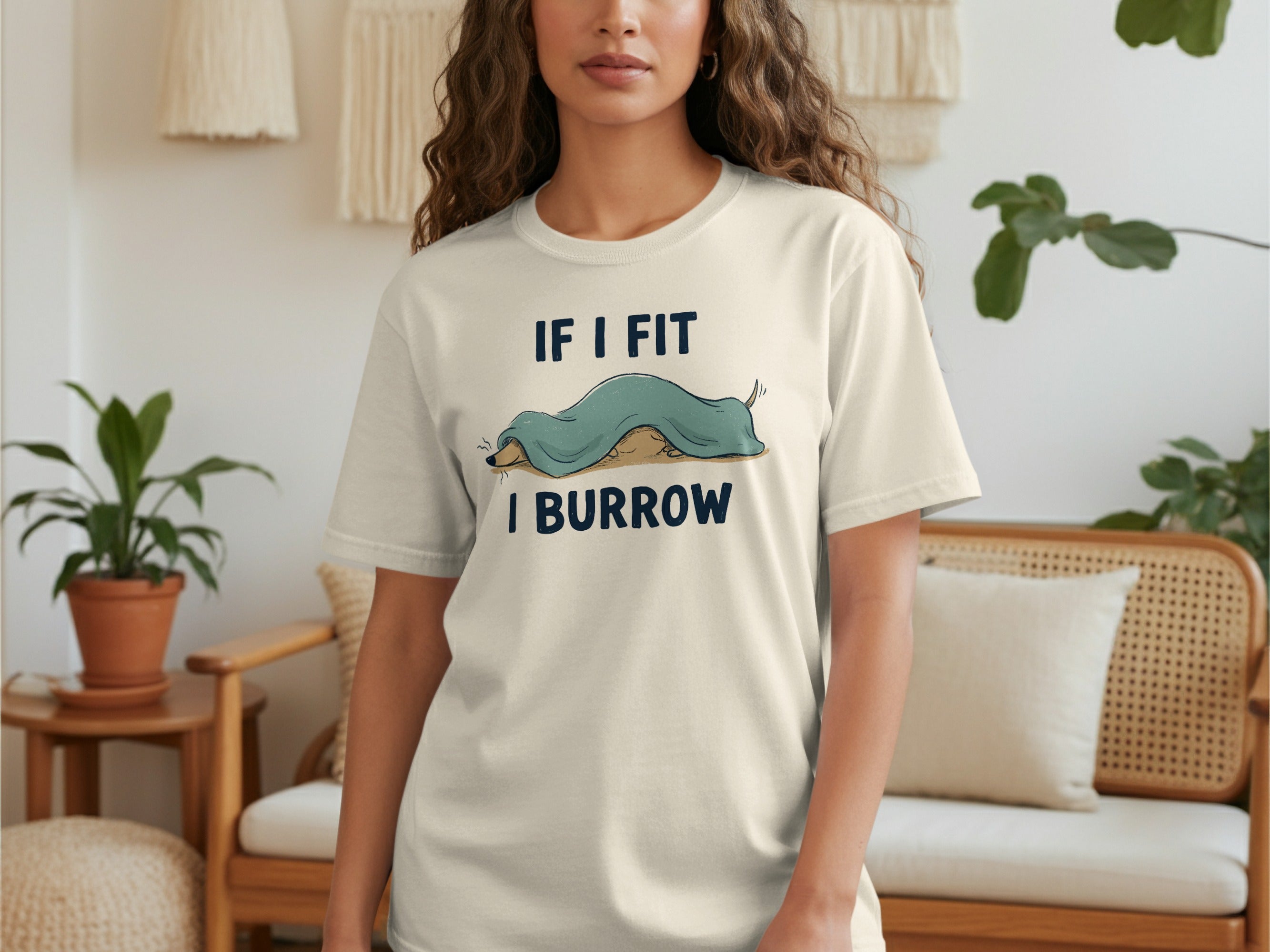 Cream t-shirt with "IF I FIT I BURROW" text and a cartoon armadillo graphic.