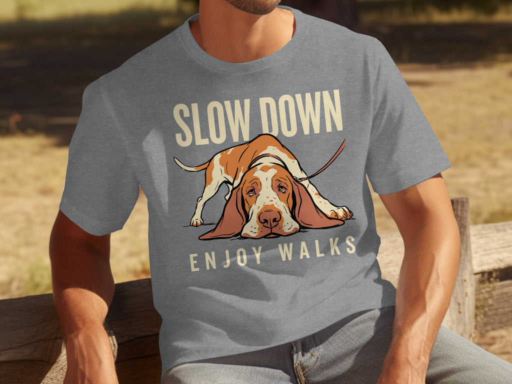 Grey t-shirt with a basset hound lying down and text "SLOW DOWN ENJOY WALKS".