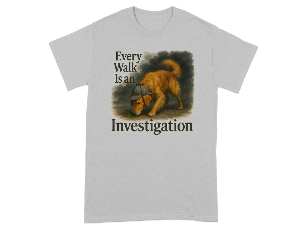 Grey t-shirt with a golden retriever wearing a hat, below text "Every Walk Is an Investigation".