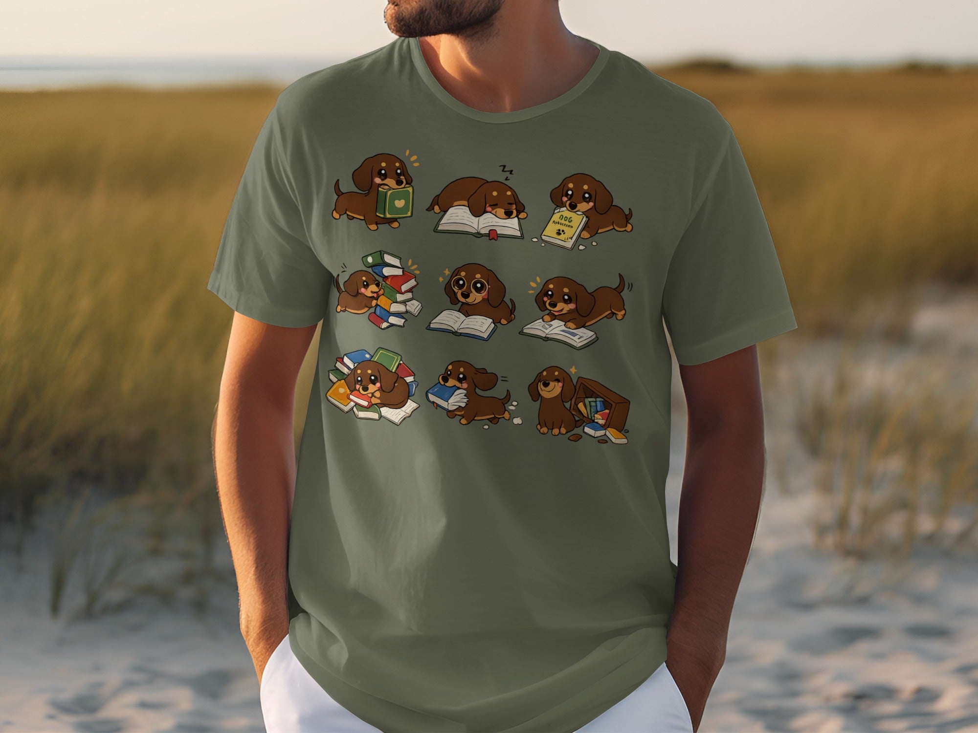 T-shirt graphic with cartoon dachshunds reading books and sleeping on them.