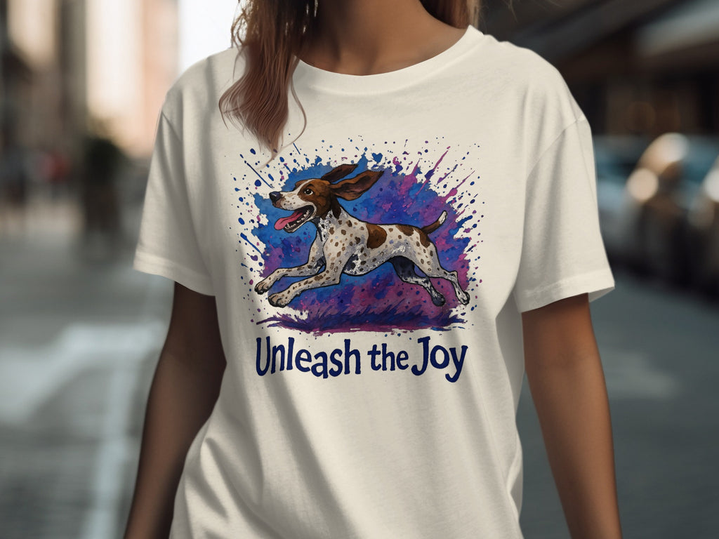 White t-shirt with a Dalmatian running, surrounded by colorful paint splatters, and text.