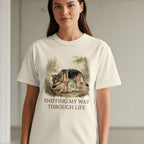 Cream t-shirt with wolf graphic and text "SNIFFING MY WAY THROUGH LIFE".