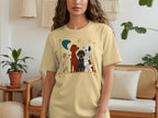 T-shirt with illustration of four dogs in a line with stars and a crescent moon.