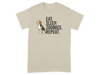 Beagle wearing bandana sits next to text: Eat. Sleep. Zoomies. Repeat.