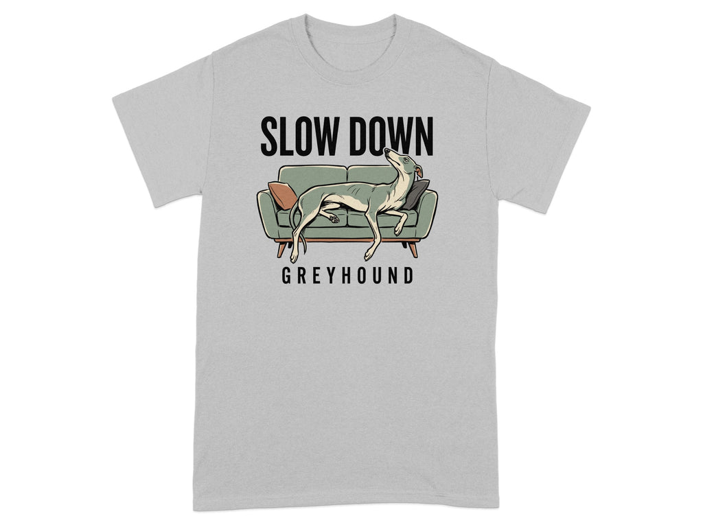 Greyhound resting on a sofa with "SLOW DOWN" text.