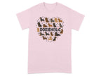 Pink t-shirt with a heart-shaped pattern of dachshunds and paw prints.