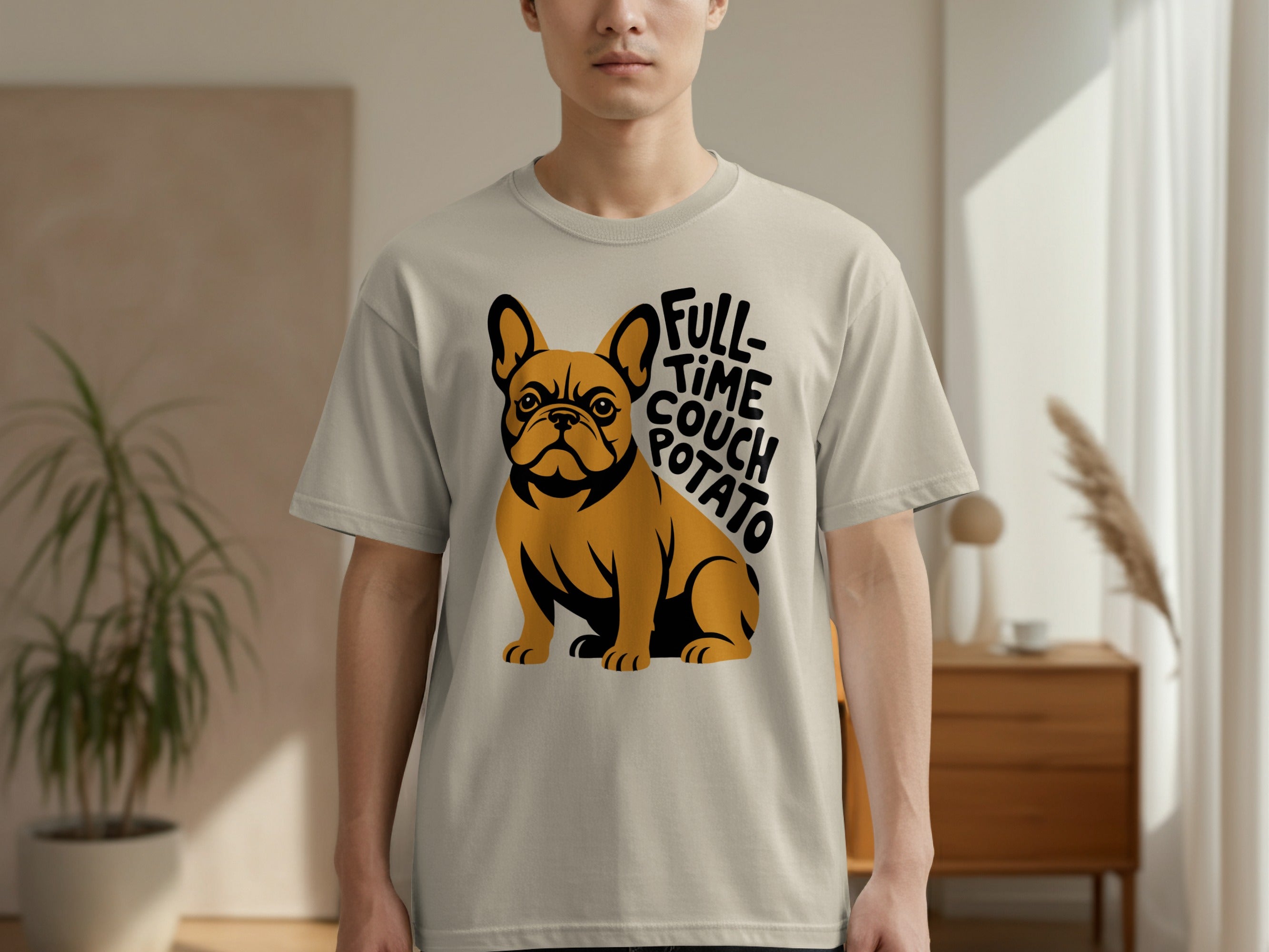 French bulldog graphic with "FULL TIME COUCH POTATO" text on a tan t-shirt.
