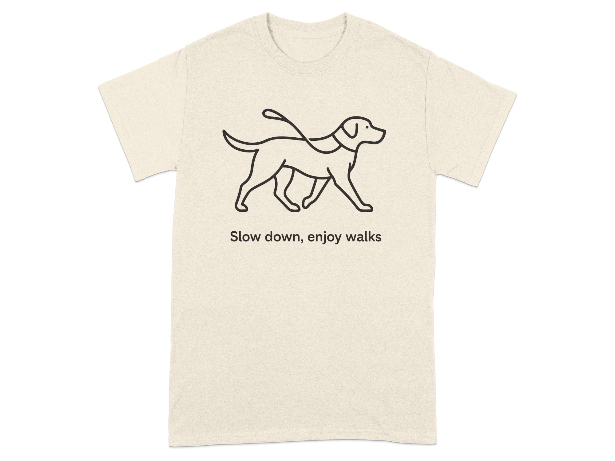 Cream t-shirt with black line drawing of a dog on a leash and text "Slow down, enjoy walks".